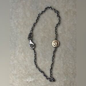 Pyrrha Delicate silver Chain Bracelet with bronze skull Accent